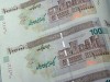 ایران چکهای100هزار تومانی كماكان در تبادلات مالی استفاده مي شوند